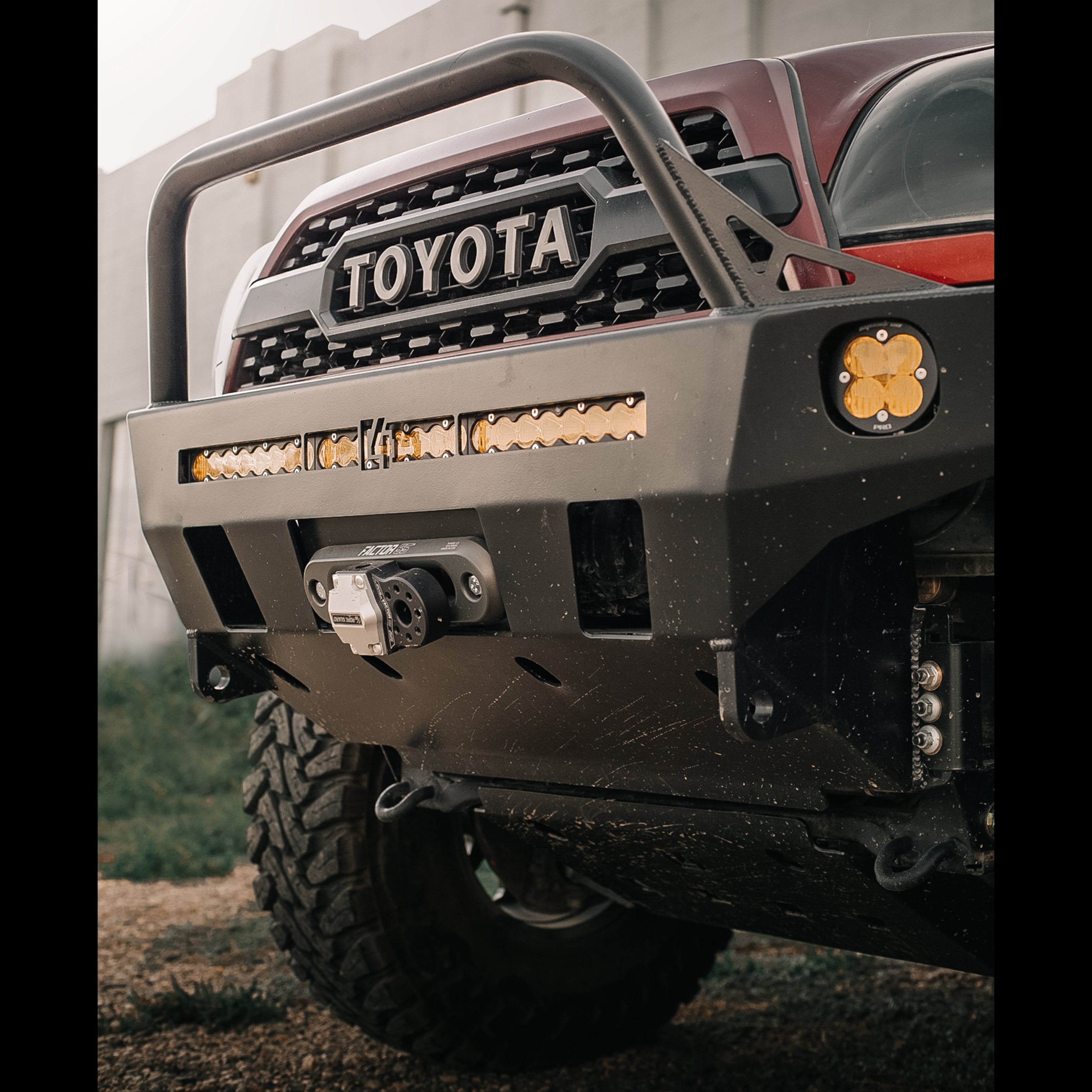 Close-up shot showing the angle of the mid-height bull bar on C4's Overland series front winch bumper.