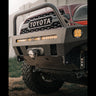 Close-up shot showing the angle of the mid-height bull bar on C4's Overland series front winch bumper.