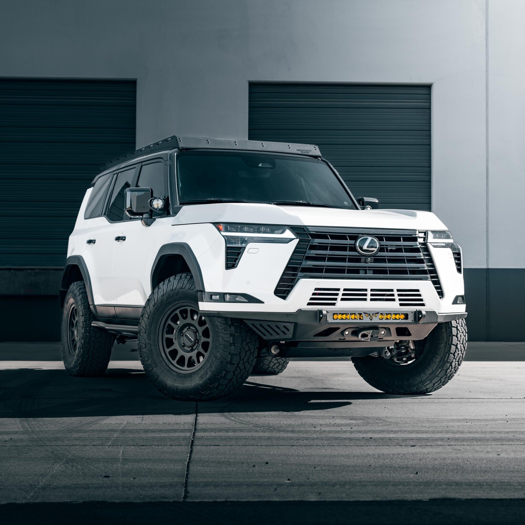 Lexus GX550 Rock Sliders by Westcott Designs - 20 degree lifestyle 3