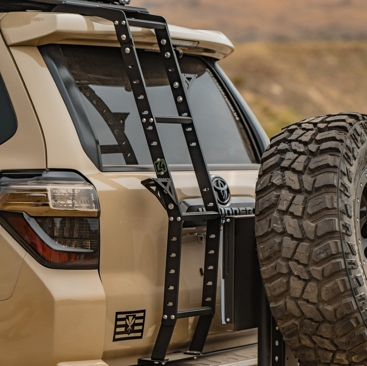 Cover photo of the C4 Summit Hatch Ladder with the background faded out and emphasis on the 4Runner and the ladder. 