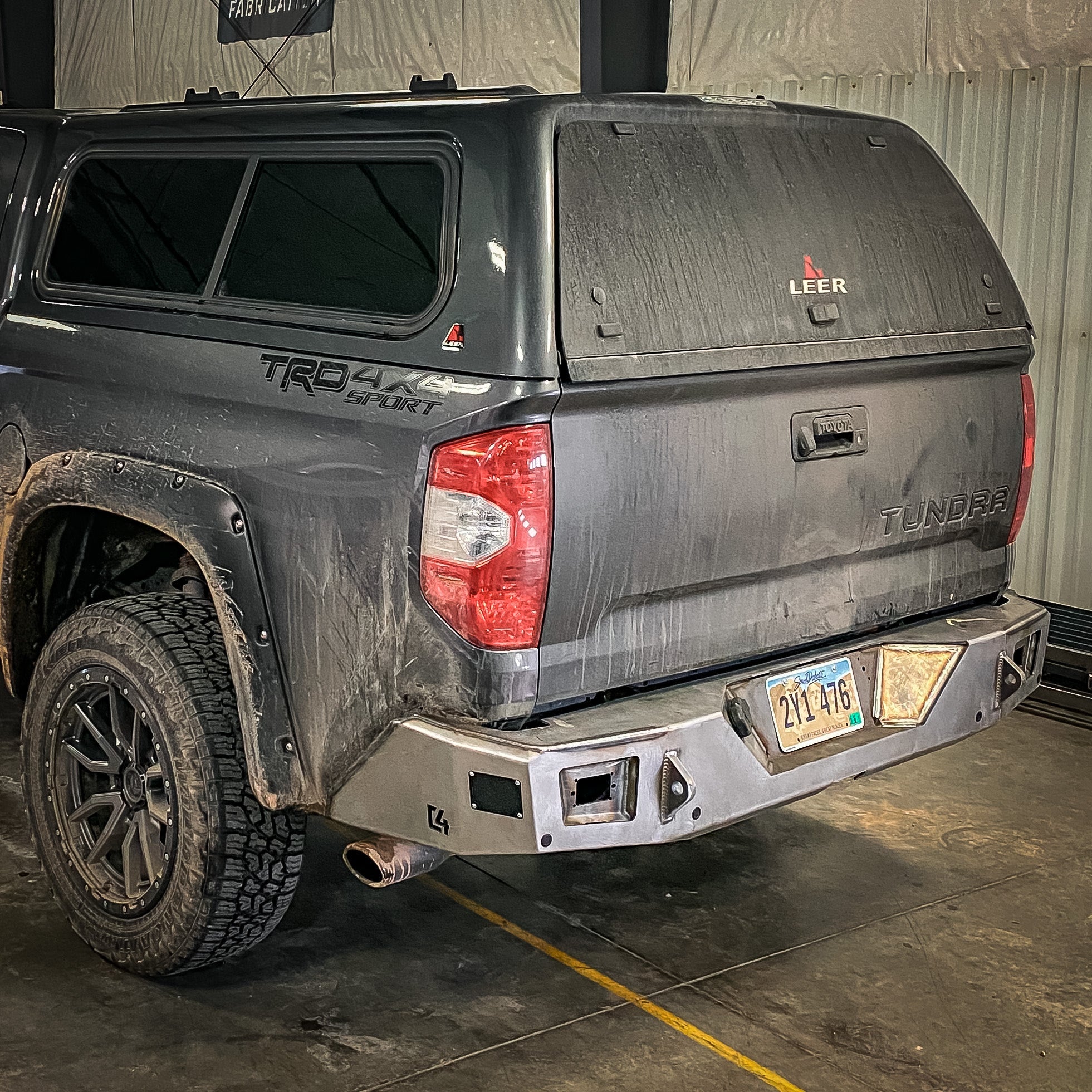 Overland rear bumper from C4 installed on a 2014-2021 Tundra showing the raw steel state that all C4 bumpers ship to customers in.