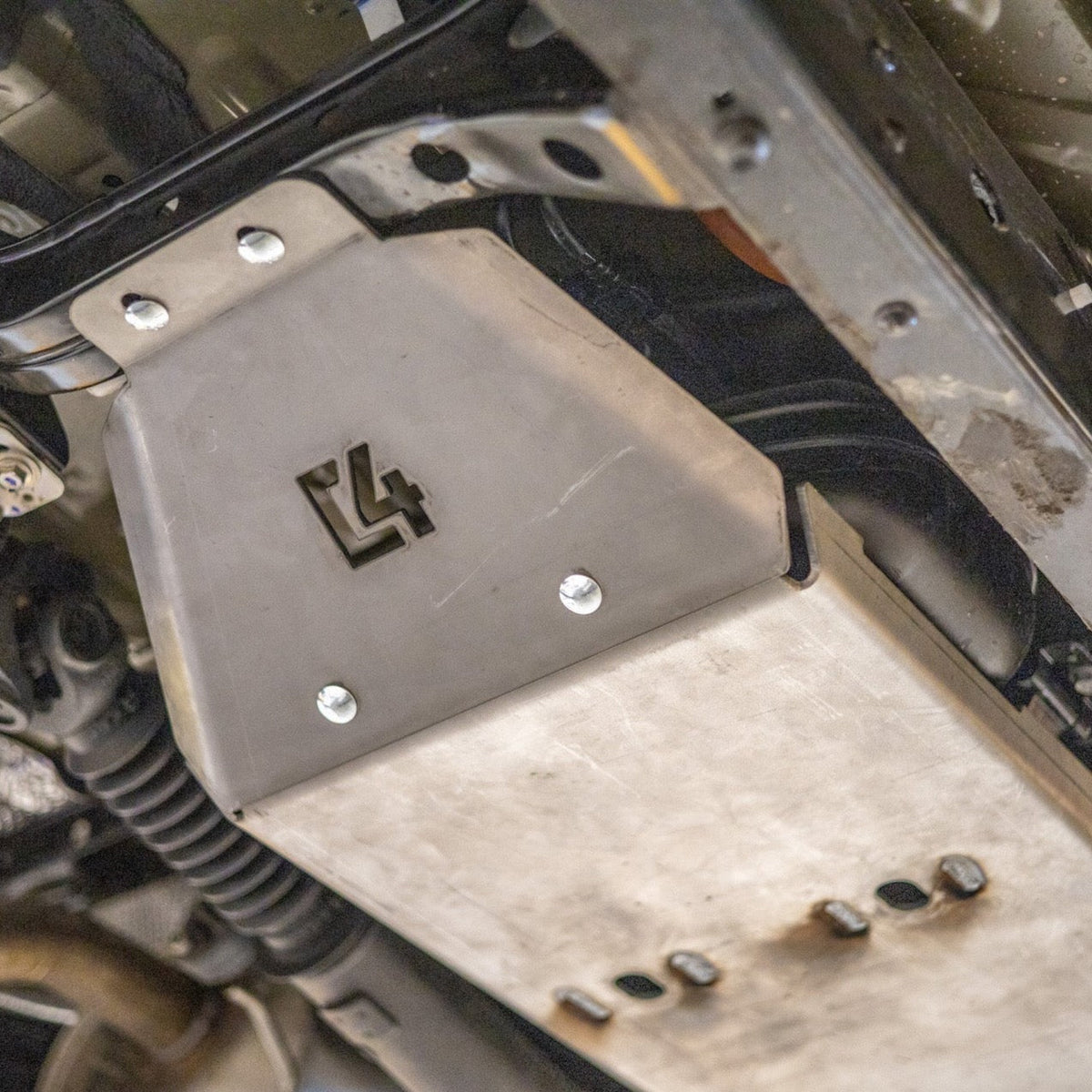 Cover photo of the 2nd Gen Tacoma fuel tank skid from C4 with the skid emphasized and everything else faded out.