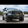 Late 2nd Generation Tundra parked on the beach with an Overland winch bumper installed.