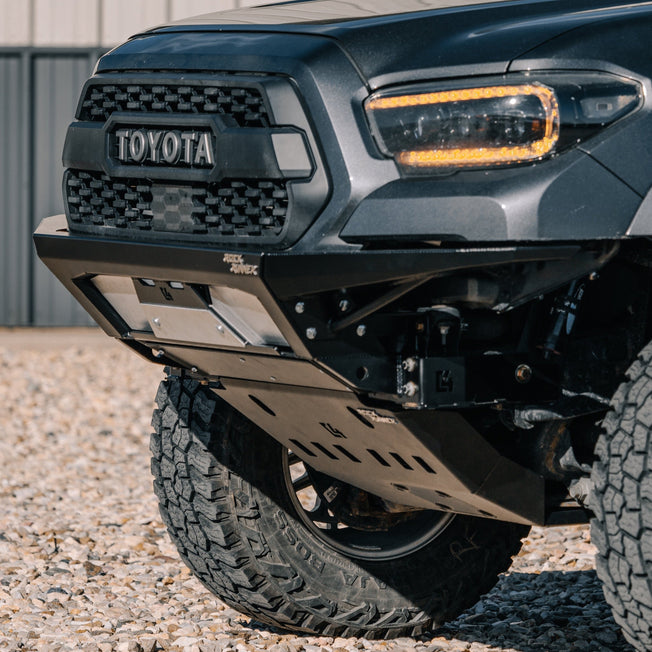 Quartering front angle showing the smooth transition from the C4 Rock Runner front bumper to the C4 Rock Runner front skid plate with the front crossmember delete. 