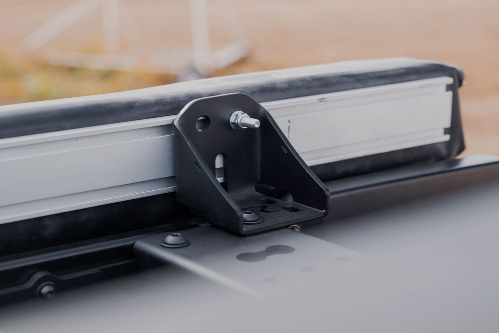 Universal Accessory Mount holding the awning on the Crossmembers for Land Cruiser or GX 550 OEM Factory Roof Rails