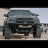 Front view of a Tacoma with no crossmember delete, showing how far down the crossmember and skid hang. 
