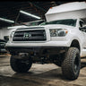 Low angle photo showing the clearance and tow points of the Overland Bumper from C4 for the early second generation Toyota Tundra.