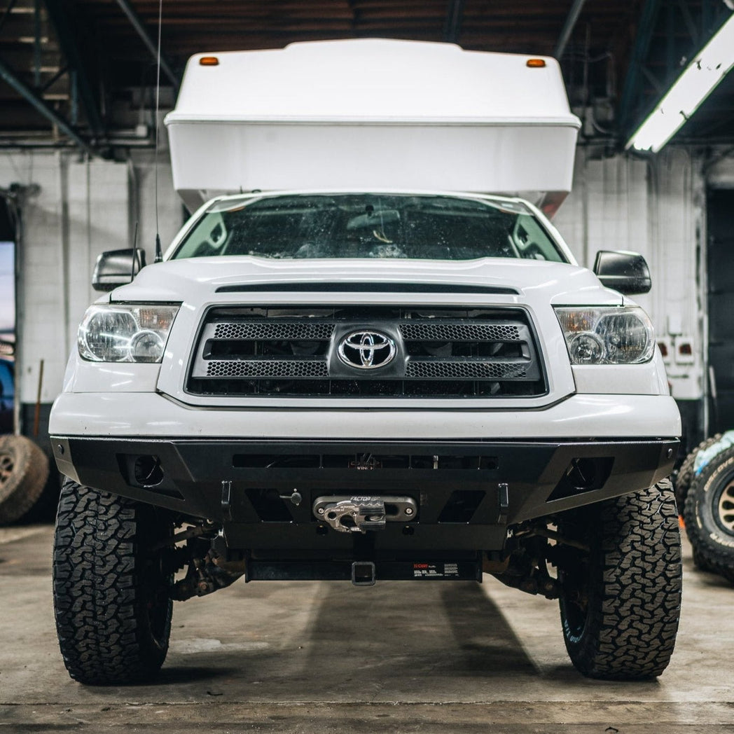 Straight on photo of the Overland front bumper for the 2002-2013 Toyota Tundra manufactured by C4 Fabrication.