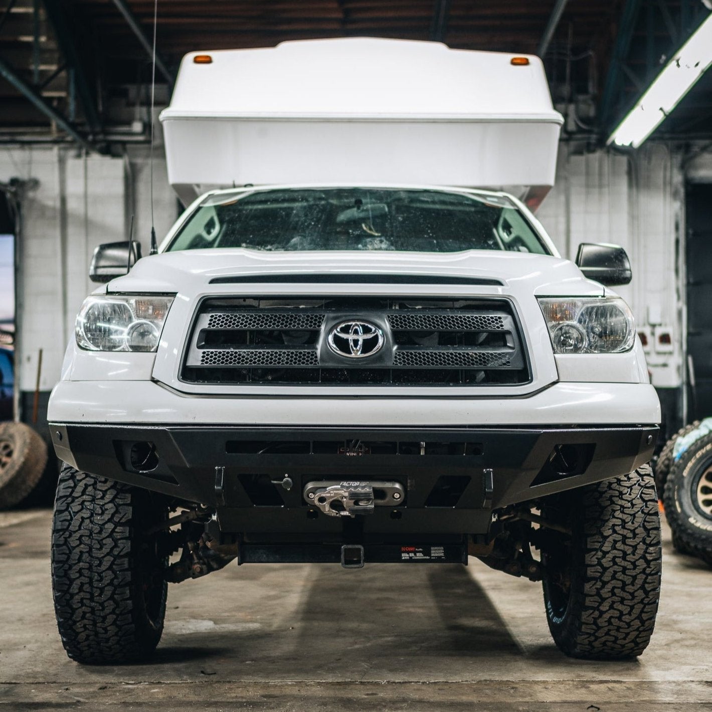 Straight on photo of the Overland front bumper for the 2002-2013 Toyota Tundra manufactured by C4 Fabrication.