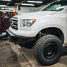 Side view of the C4 Overland Bumper for the Toyota Tundra showing the bumper without either of the bull bar options.
