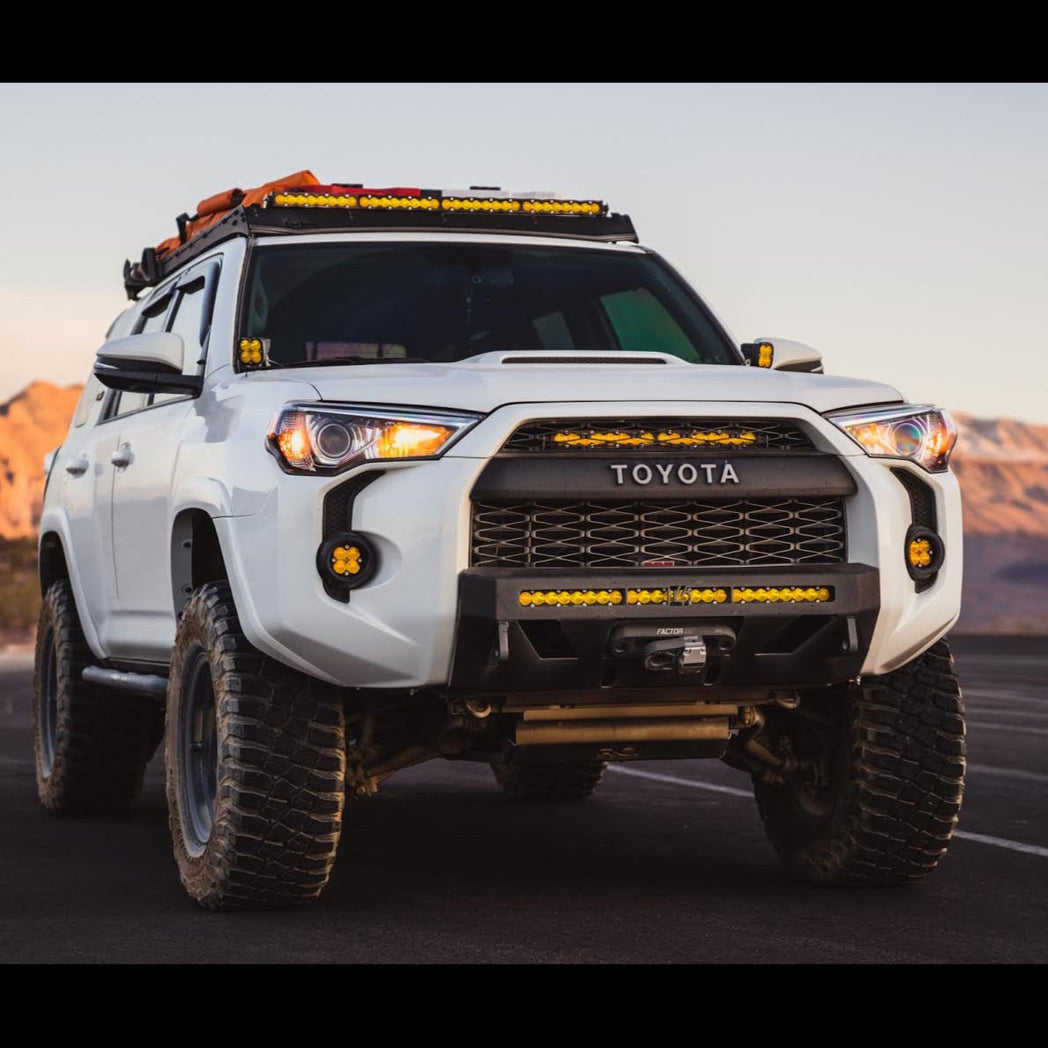 C4 Lo-Pro bumper with no bull bar installed on a white 5th Gen 4Runner.