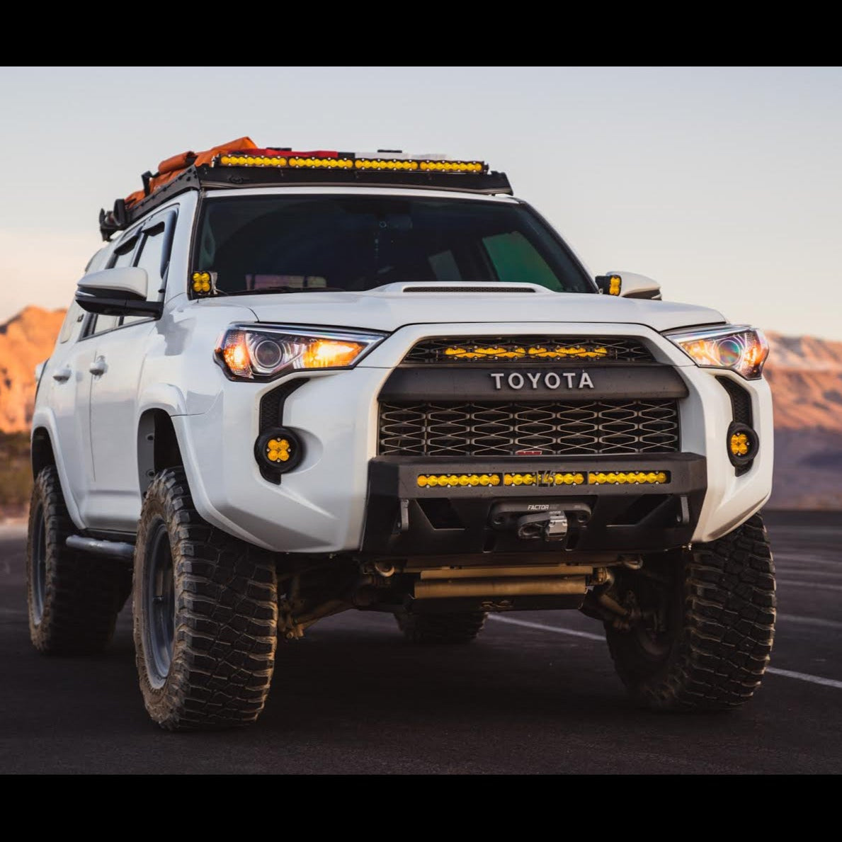 C4 Lo-Pro bumper with no bull bar installed on a white 5th Gen 4Runner.
