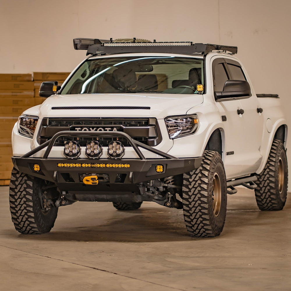 White 2014 Tundra with a C4 Fabrication Overland front winch bumper installed.