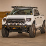 White 2014 Tundra with a C4 Fabrication Overland front winch bumper installed.