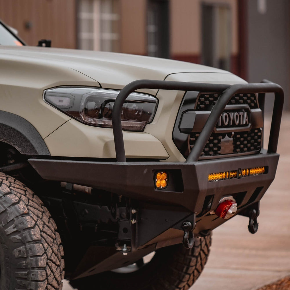 Quartering side view of the C4 Overland bumper with full-height bull bar and headlight hoops.