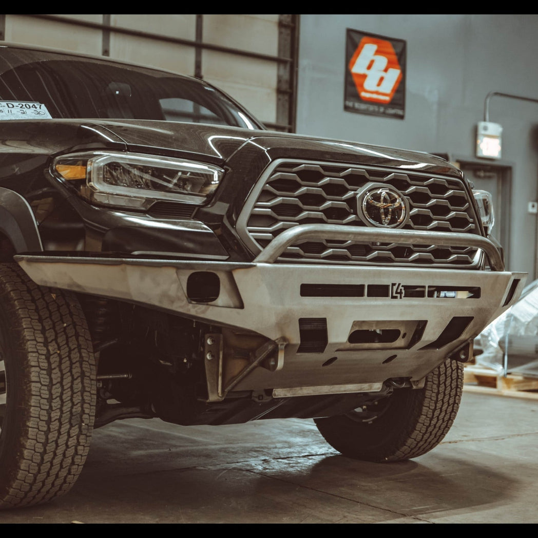 C4 Overland front winch bumper for the 3rd Gen Tacoma in raw steel.