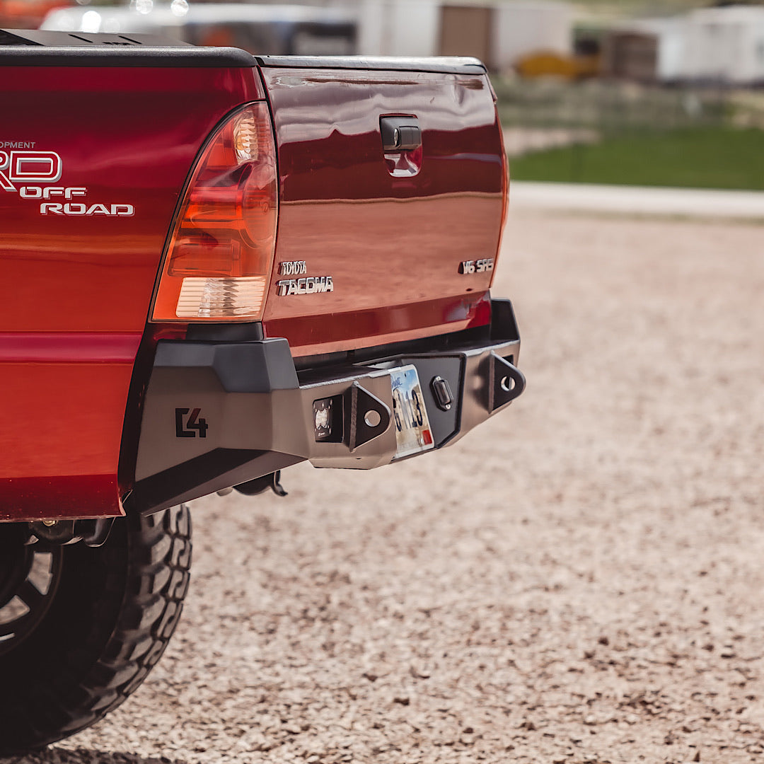 Cover photo for the C4 Overland Rear Bumper for the 2nd Generation Toyota Tacoma with the truck and bumper emphasized and the rest of the photo faded out.