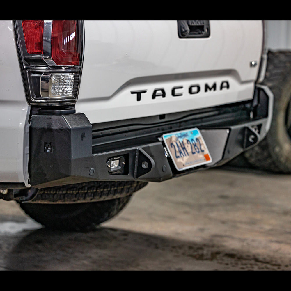 Quartering view of the C4 Overland rear bumper for the Toyota Tacoma. 