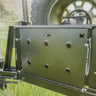 View of the integrated table folded up and stowed on the C4 rear swing-out. 