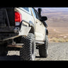 Rear side shot showing the incredible amount of clearance and departure angle gained with the C4 High Clearance Rear Bumper for the Toyota Tacoma.