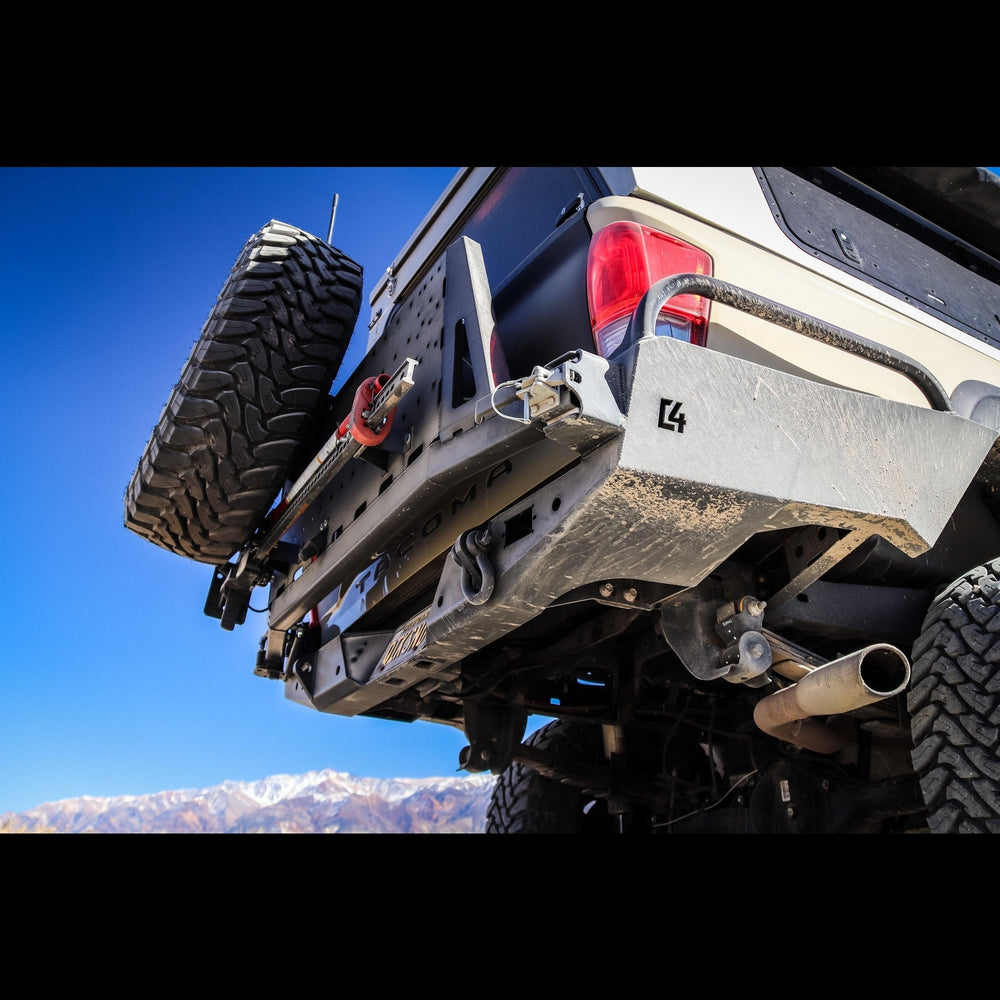Low-angle view showing the structure and armor of the C4 High Clearance Rear Bumper for the Tacoma.