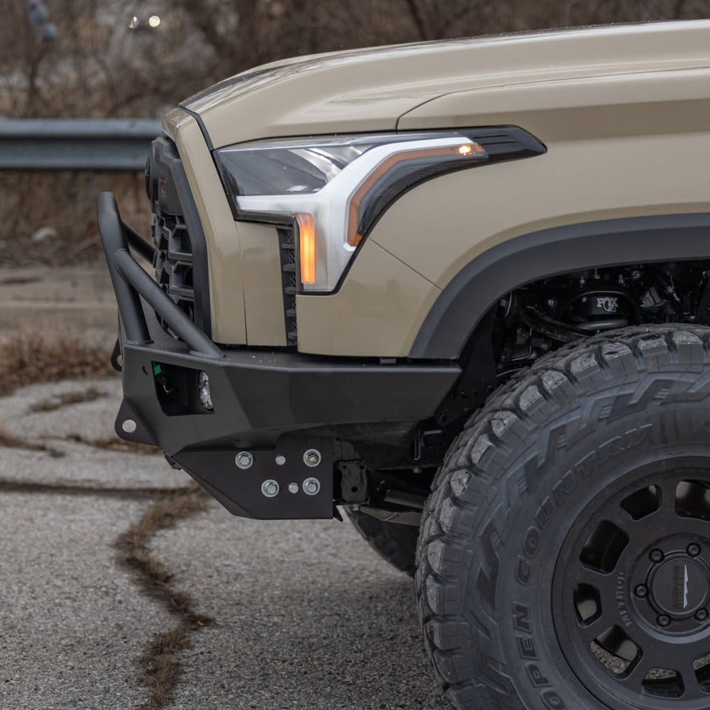Close-up shot from the side of the C4 Overland bumper for the Toyota Tundra showing its tight conformation to the front of the grille.