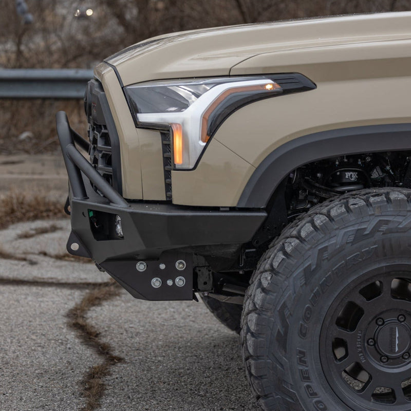 Close-up shot from the side of the C4 Overland bumper for the Toyota Tundra showing its tight conformation to the front of the grille.