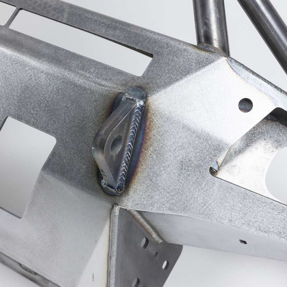 Close-up photo of the Overland Bumper from C4 Fabrication highlighting the integrated tow points welded into the bumper from both front and back.