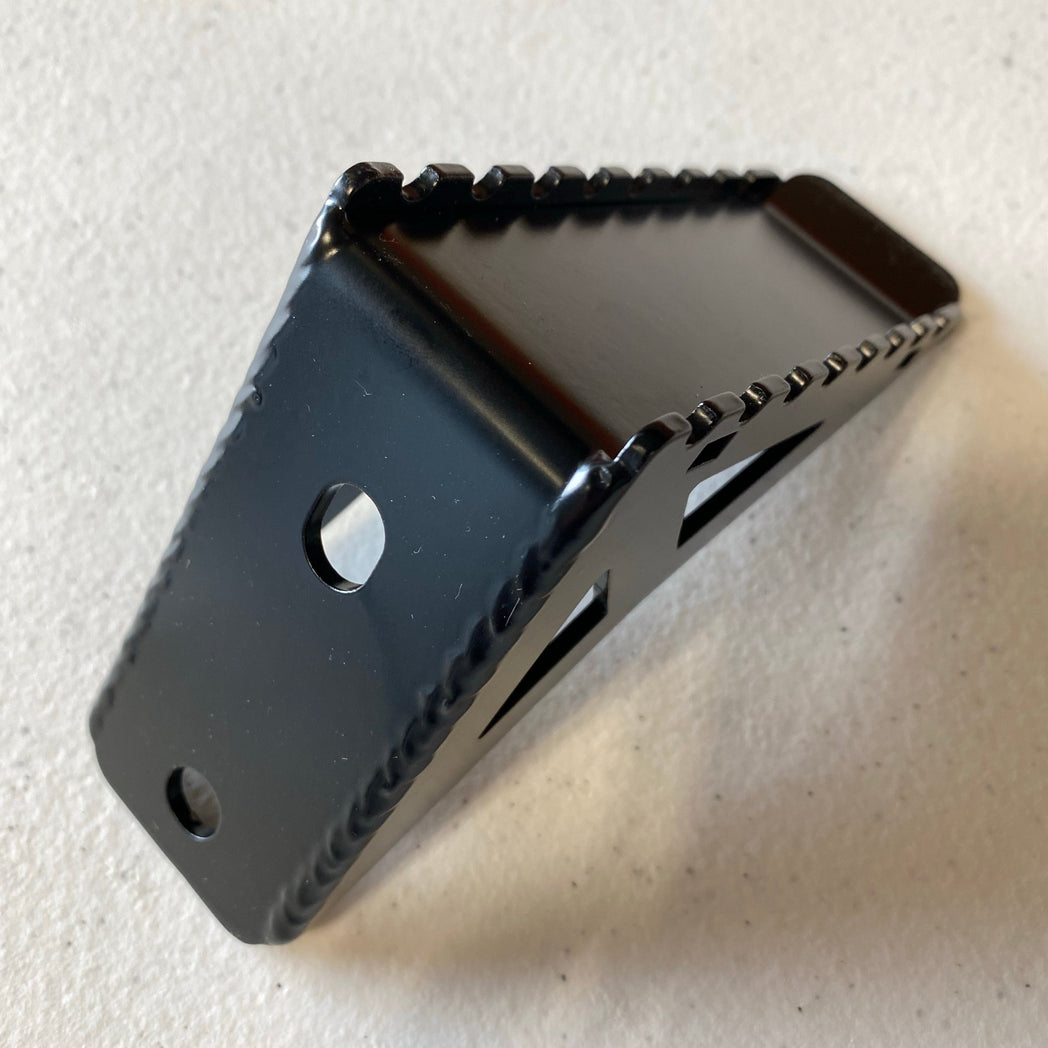 Close-up image showing the serrated top step plate and high quality welds of the C4 accessory side step for the Summit hatch ladder.