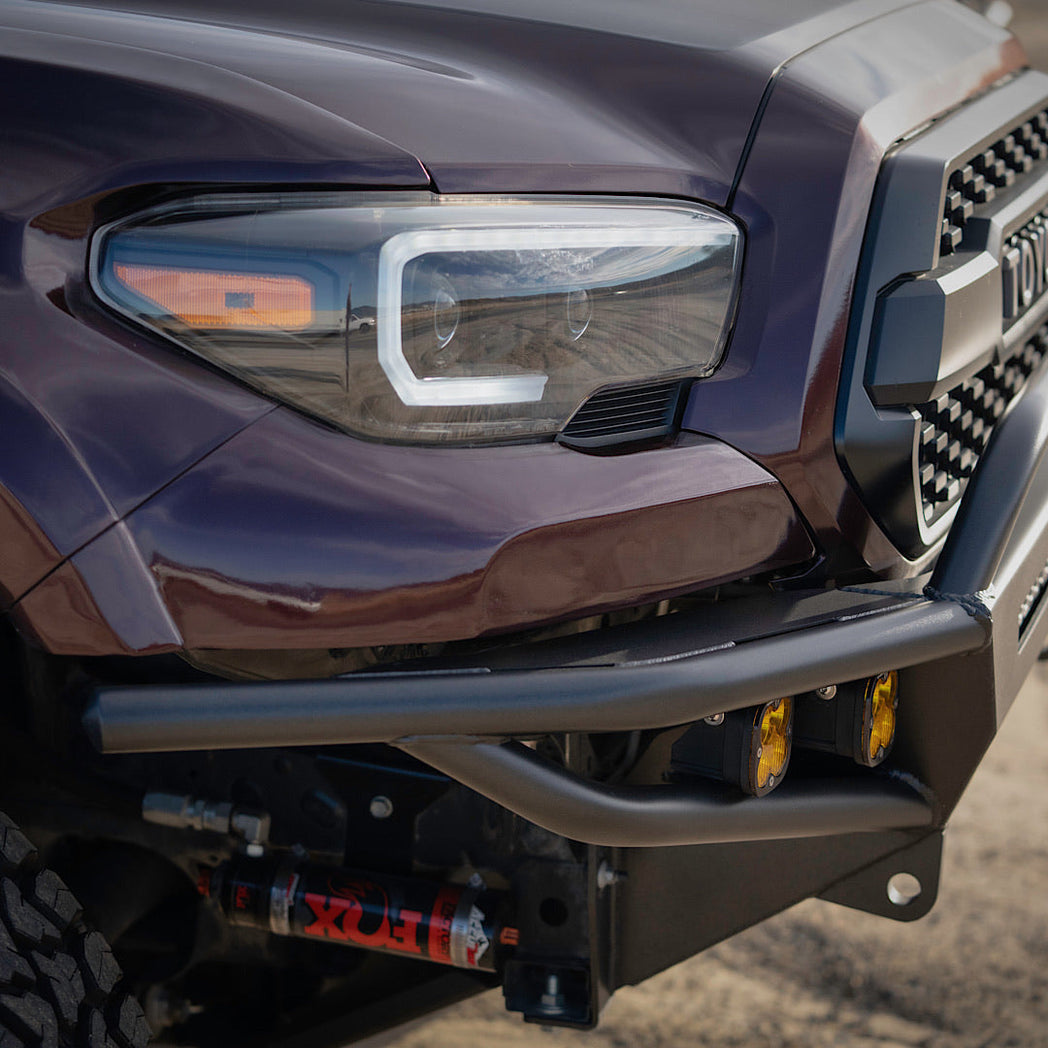 Purple Tacoma with C4 Hybrid front winch bumper.
