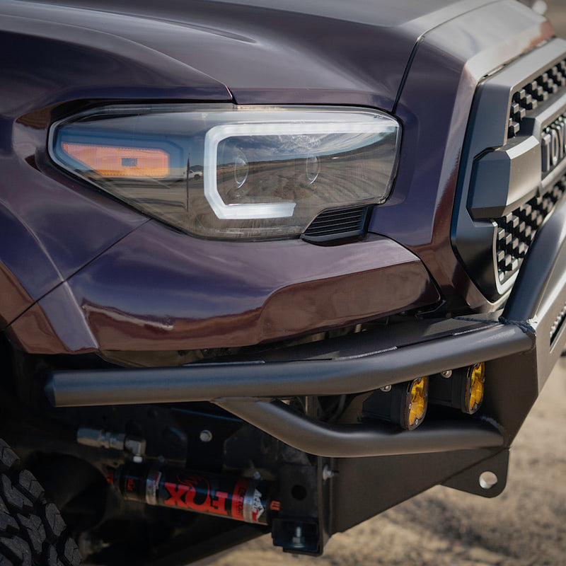 Purple Tacoma with C4 Hybrid front winch bumper.
