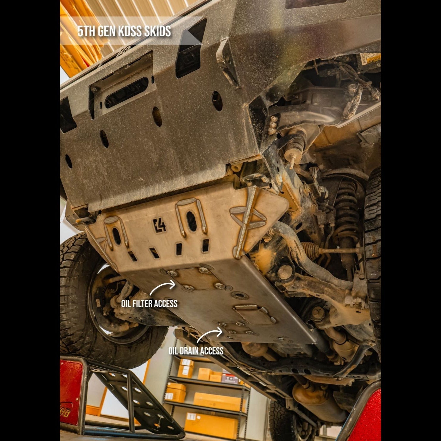 View from below on the KDSS skid variant, showing the access panels on it for the oil filter and oil drain.