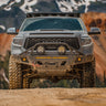 Front view of a grey Tundra in the mountains with a US-made steel front winch bumper from C4 Fabrications based in Sturgis, South Dakota. 