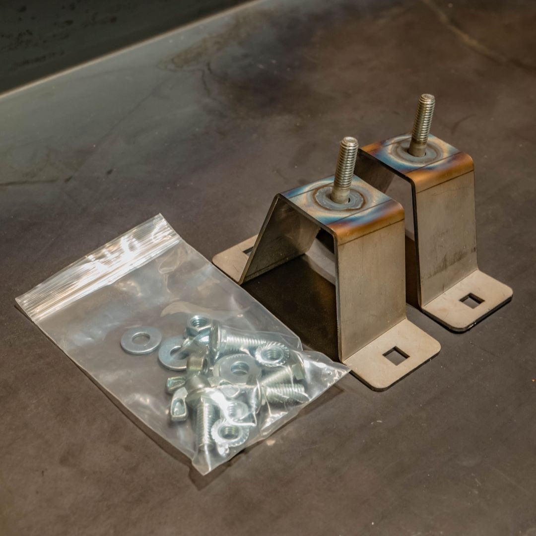 Cover photo for the C4 HiLift jack brackets with emphasis on the parts themselves and the background faded out.