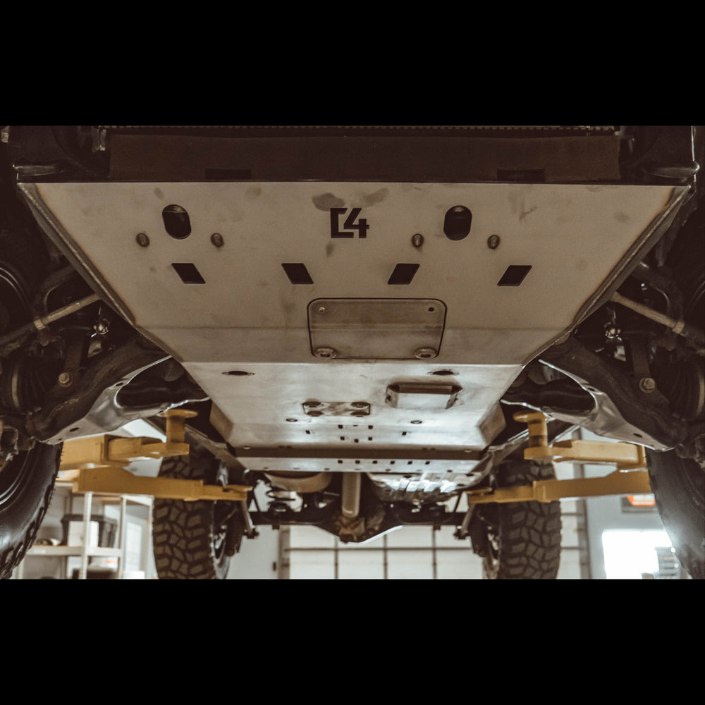 Close up view of C4 Fabrication's front skid plate on a 5th Gen 4Runner, showing its raw steel form that it ships to customers in.