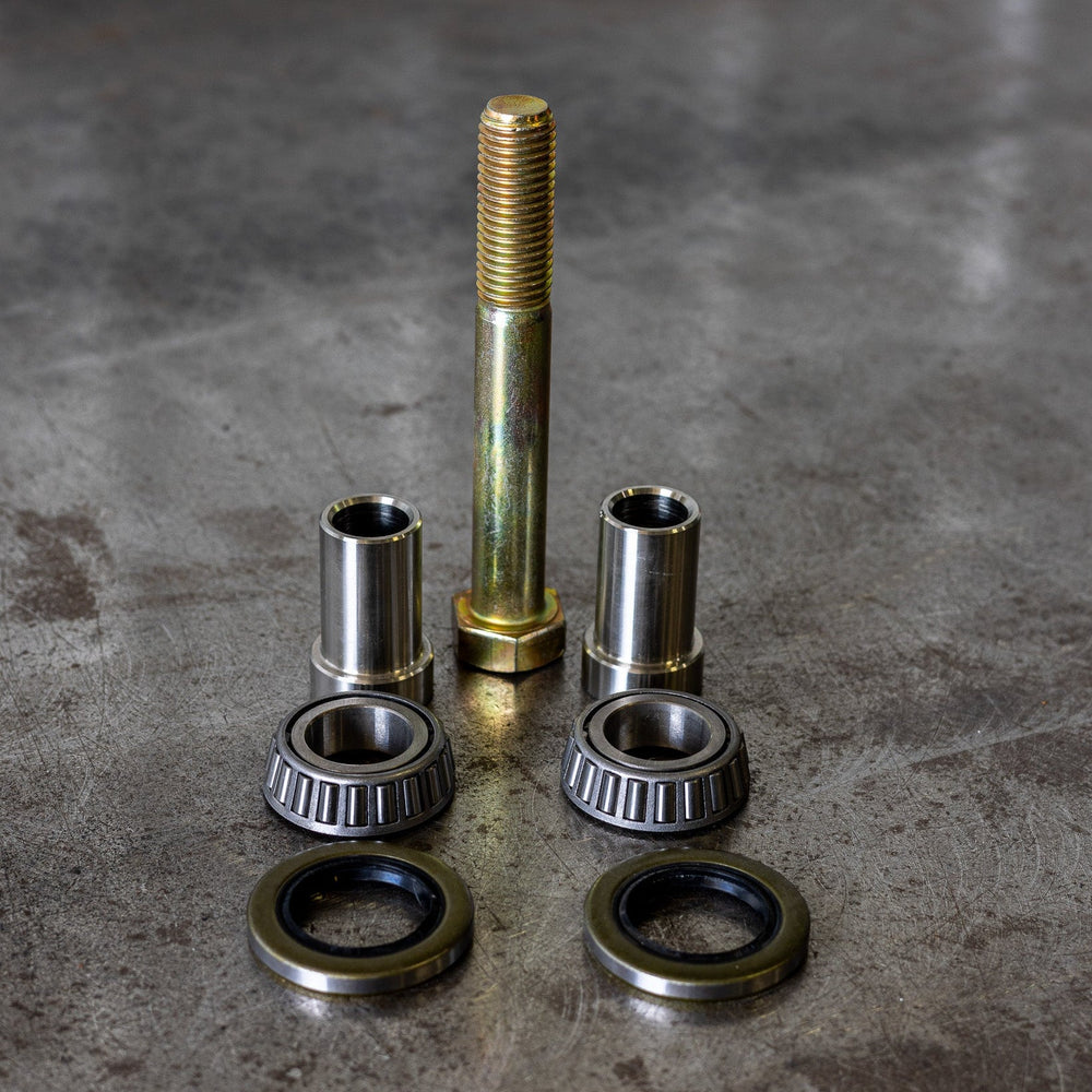 Close up view of all the components of the C4 swing arm bearing rebuild kit.