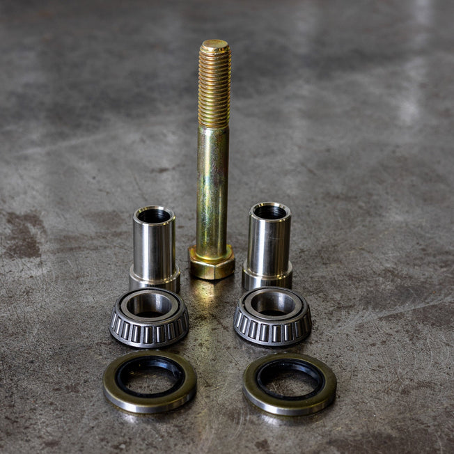 Close up view of all the components of the C4 swing arm bearing rebuild kit.