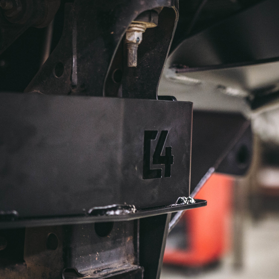 Cover photo for the C4 Frame Support bracket for the 2nd Gen Tacoma with the background faded out and emphasis on the bracket.