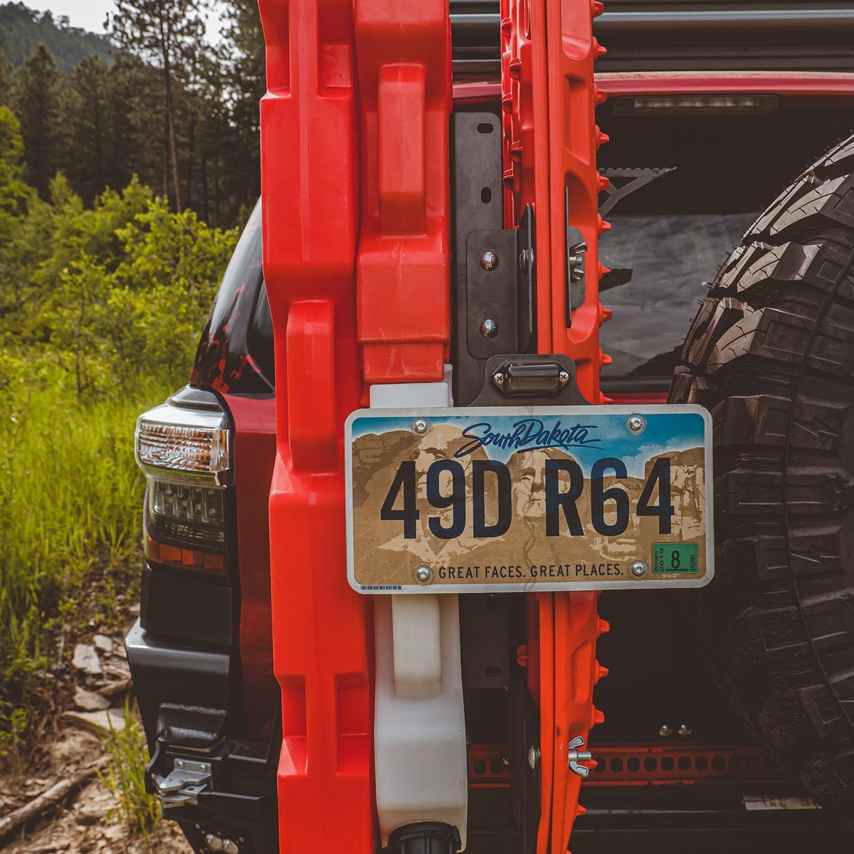 Cover photo for the C4 Maxtrax and Rotopax mount for rear bumpers with emphasis on the mount and everything else faded out.